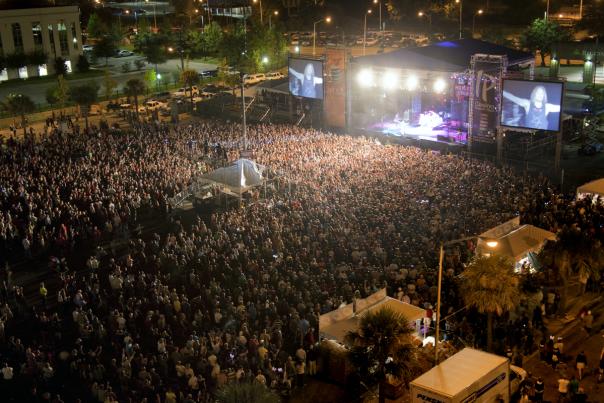 large crowd in front of a stage