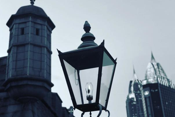 Street lantern in front of the turret at Colonial Fort Conde and the RSA tower