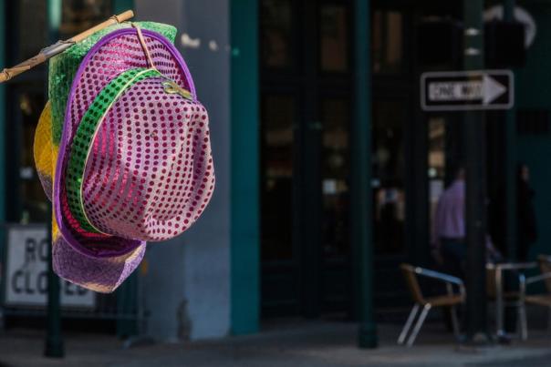 Sequin Mardi Gras fedora hanging outside