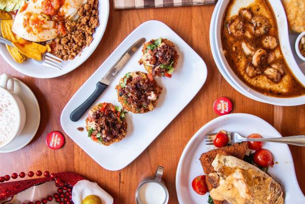 table with a spread of four meals for brunch
