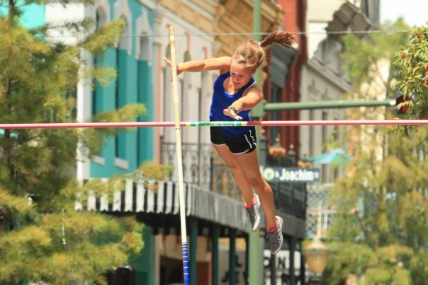 Woman pole vaulting