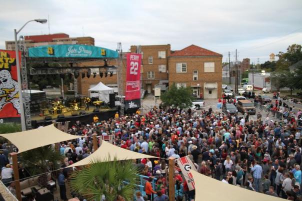 aerial view of a crowd around a stage