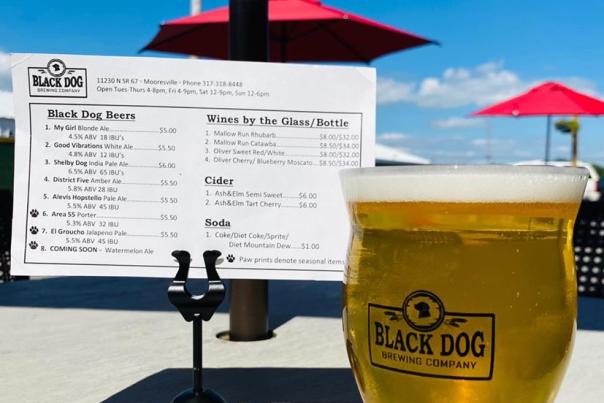 Enjoy locally crafted brews, plus wine and cider, on the patio at Black Dog Brewing Company in Mooresville.