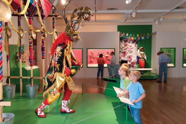 Ceremonial masks and larger-than-life costumes at the Museum of International Folk Art
