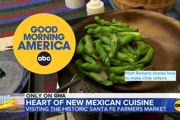 green chile is being roasted in an iron pan, surrounded by kitchen supplies. Text reads Good Morning America ABC, Matt Romero shares how to make chile relleno. ONLY ON GMA, Heart of New Mexican Cuisine: visiting the historic Santa Fe Farmers Market