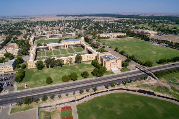 an aerial view of the town of Roswell, a large campus next to a big roadway dominates the image.