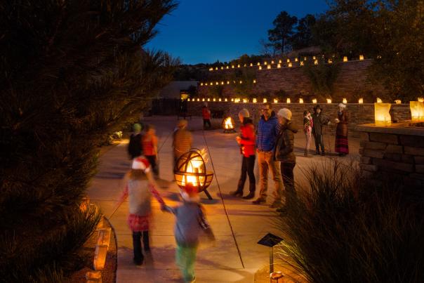 A brown paper bag, a handful of sand, and a votive candle add up to Christmas cheer in New Mexican.