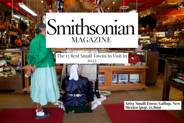 a person stands in green and blue clothing, inside a small shop, text reads Smithsonian Magazine, The 15 Best Small Towns to Visit in 2022. Artsy Small Town, Gallup New Mexico. Pop. 21,899