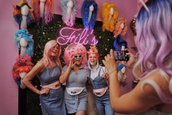 Trying on Wigs at Fifi Mahony’s in New Orleans