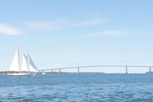 Sailboat in Newport Harbor with Newport Bridge