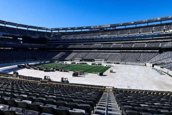 Wide view of MetLife Stadium with field preparation visible for the 2026 World Cup.