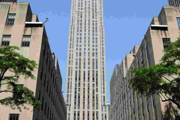 View of 30 Rockefeller Plaza rising above the Midtown Manhattan skyline, the centerpiece of the Rockefeller Center complex