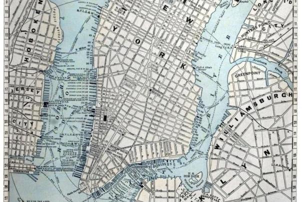 Antique map of lower Manhattan and the surrounding region, including Brooklyn, Jersey City, and New York Bay, showing the irregular street layout of lower Manhattan in contrast to the planned grid pattern of upper Manhattan.