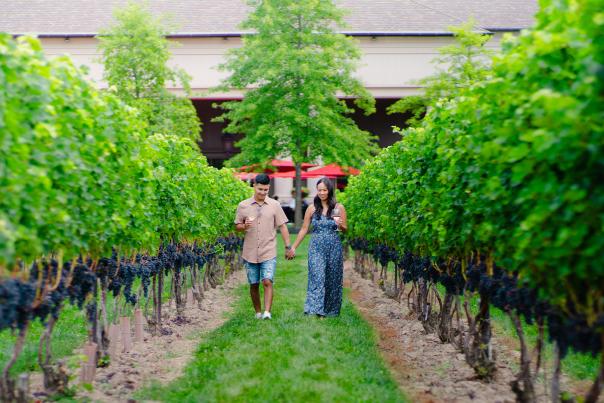 Couple Walking Two Sisters Vineyard