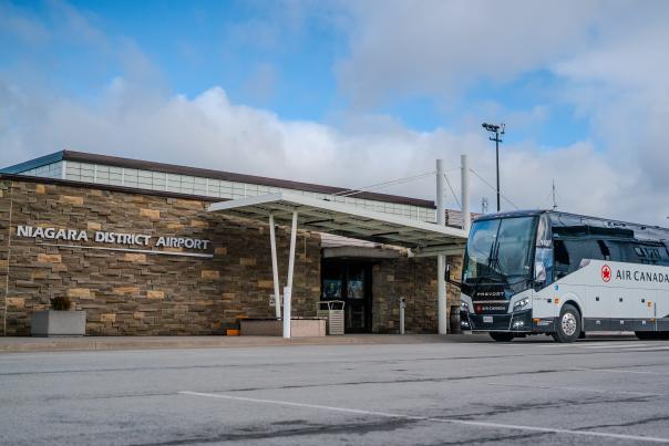Air Canada motorcoach service parked outside of airport