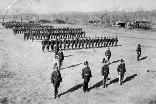 U.S. troops stand in formation on the parade grounds, 1885.
