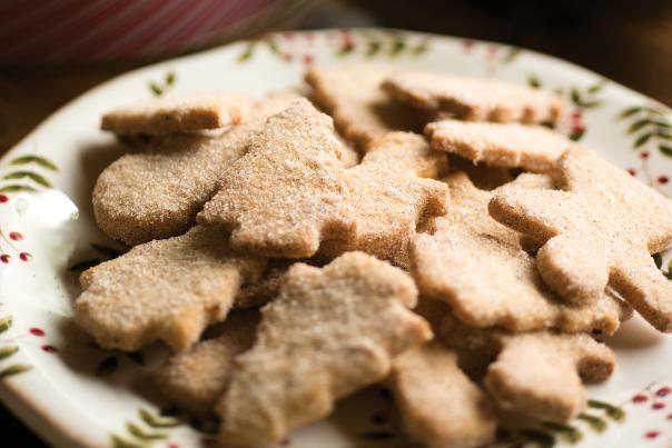 Plate of Christmas tree-shaped biscochito cookies