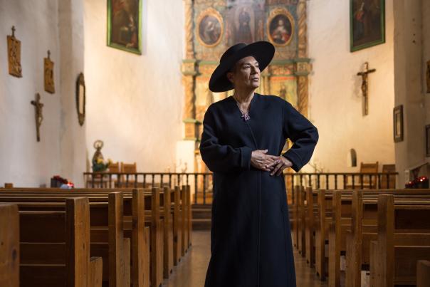 Nacha Mendez stands in Santa Fe’s San Miguel Chapel, the oldest church in the continental United States.