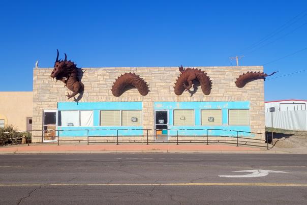 In Clayton, there's a seven-foot red metal dragon installed in a long-vacant building by artist Bennie Duran in the mid-1990s.