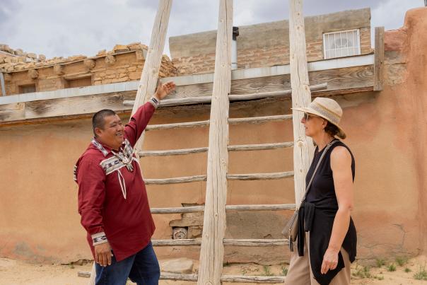Guide Brandon “Turtle” Valdo points out the architectural hallmarks of Old Acoma Village.