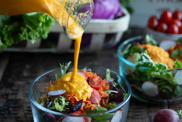 Reunity Resources's carrot dressing on salad.