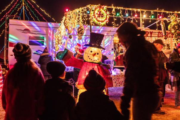 Holiday displays and lighted RVs draw a crowd at the Elephant Butte Luminaria Beachwalk.