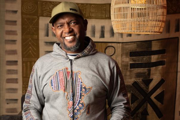 Ahmed Obo brings Afro-Caribbean flair to his personal style and his cuisine.