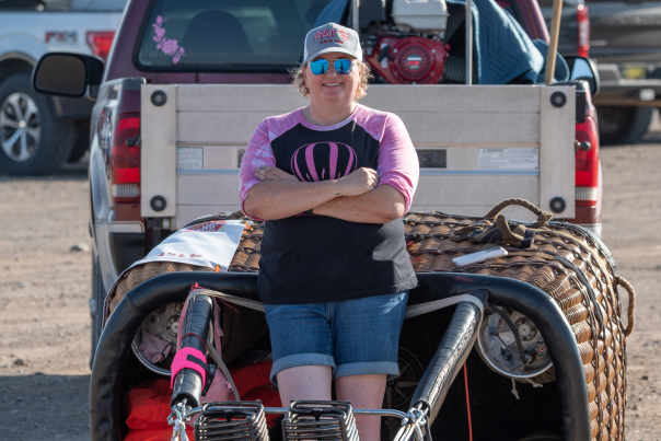 Karen Converse and her crew match Penumbra, her 90,000-cubic-foot balloon, in pink and black.