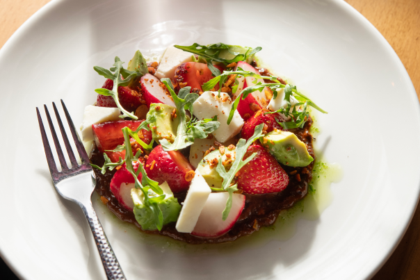 Strawberry avocado salad with pecan salsa macha.