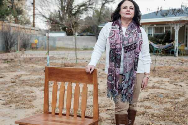 Naomi Sandweiss with the heirloom in her Northeast Heights backyard.