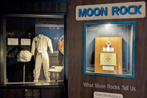 A moon rock from the Taurus-Littrow Valley, symbolizing Robert H. Goddard's pioneering work in rocket propulsion, is displayed at the Roswell Museum.
