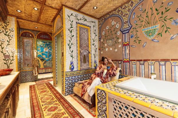 The bathrooms at the Inn of the Five Graces feature a walk-in shower, soaking tub, and a mesmerizing display of colors, shapes, and textures.