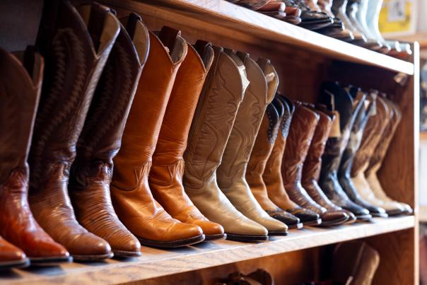 A shelf of western boots at Kowboyz.