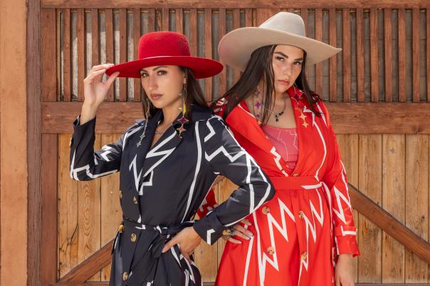Amaya Sullivan (left) and Yaya wear Sky-Eagle dresses.