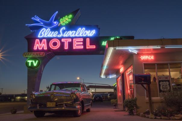 The neon sign at the Blue Swallow Motel in Tucumcari calls for a road trip in your favorite ride.