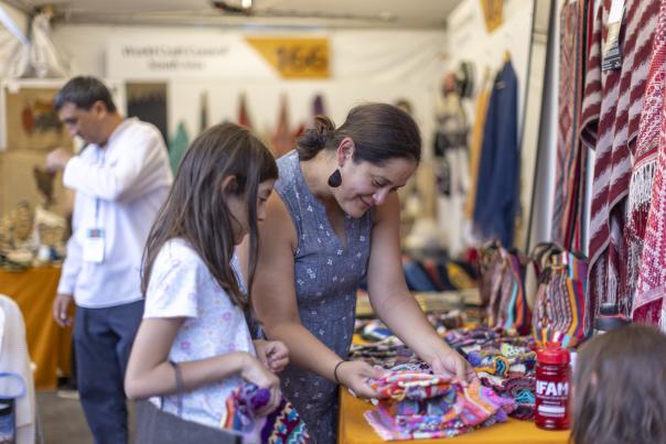 Mother and daughter shopping at the International Folk Art Market.