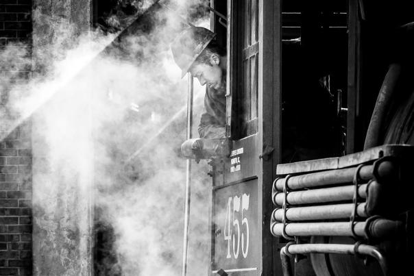 In the photograph Chama 455, Rio Rancho–based photographer Jim Shepka captures a Cumbres and Toltec train engineer venting steam from Engine 455.