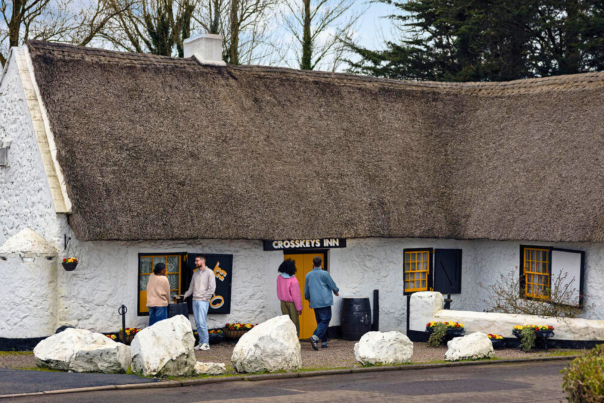 Exterior Shot of A Couple Walking Into the Crosskeys Inn