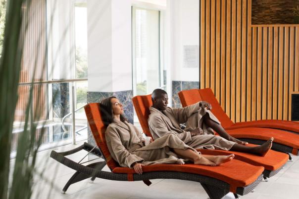Couple relaxing in robes at the Hastings Culloden Estate and Spa