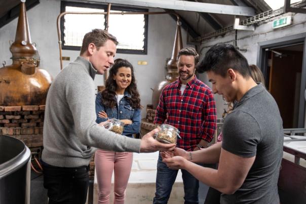 Young group enjoying a tour at Killowen Distillery