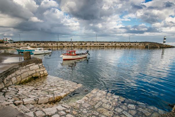 Three boats sitting in the harbour at Carnlough, County Antrim