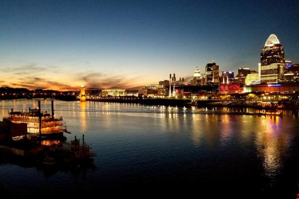 Sunset over the Ohio river with the Cincinnati and BB Riverboat