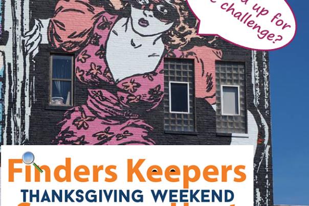 The Faile mural in Covington Kentucky of a cat burglar with the words, Are you up for the challenge? for the Thanksgiving scavenger hunt