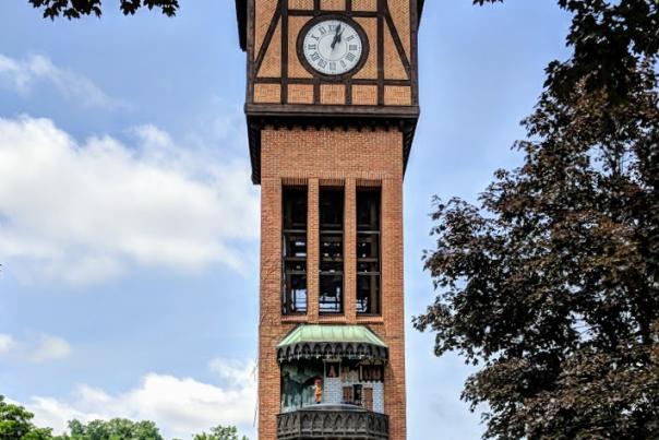The brick Carroll Chimes Clock Tower in Mainstrasse Village on a sunny day