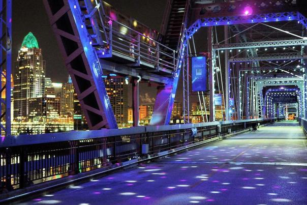 The Purple People Bridge across the Ohio river lighted up for the holidays with the Cincinnati skyline in the background, viewed from Newport, Ky.
