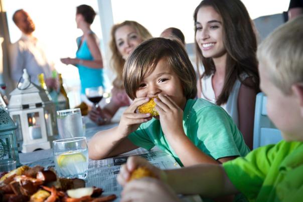 Kid Eating Corn