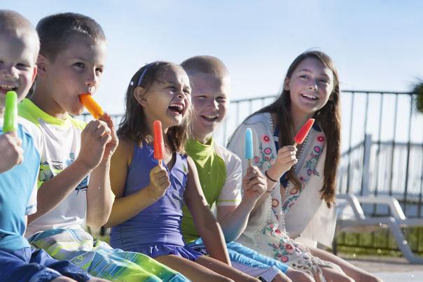 Kids eating popsicles