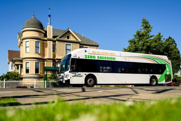 ac transit bus by victorian house