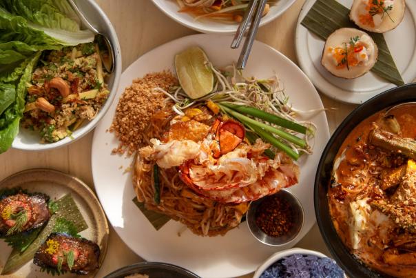 Table filled with delicious dishes from Jos Modern Thai in Oakland California