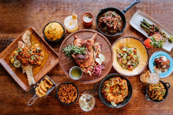 Spread of food at alamar dominican kitchen in Oakland california